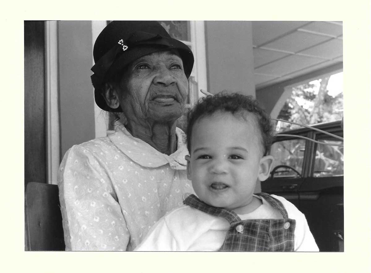 2.-Miss-Iris-with-her-greatgranddaughter-Kamala-%C2%A9-Donald-J.jpg